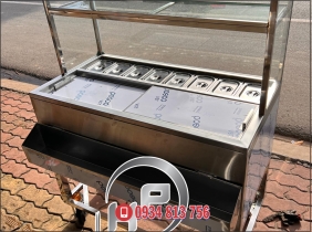 THÙNG ĐÁ INOX CÓ CHÂN BÁNH XE GIỮ  LẠNH 8 KHAY TOPPING 1/9 KẾT HỢP KỆ KÍNH